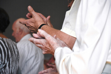 hands of the elderly person