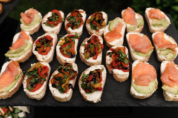Served table with snacks and empty glasses. Delicious dishes at the wedding ceremony close-up. The restaurant table is prepared for the celebration of the event. party concept