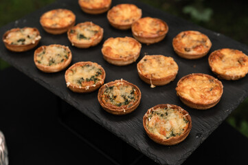 Served table with snacks and empty glasses. Delicious dishes at the wedding ceremony close-up. The restaurant table is prepared for the celebration of the event. party concept