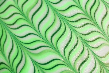 Stunning gradient green wavy pattern of a decorative doughnut for abstract backdrop