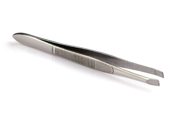 Little metal hair tweezers isolated over white background