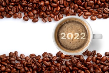 Cup of coffee with aroma roasted beans