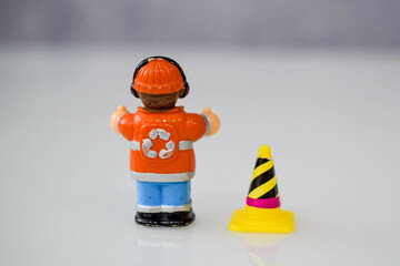a road worker or a worker with a jackhammer in various situations on the road, dolls 