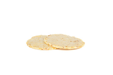 Two round dry cornbread isolated on white background.