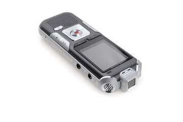 The voice recorder is isolated on a white background. Dictaphone close-up on a white background.
