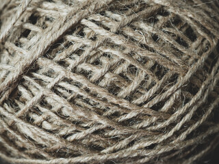 Hemp rope close up on wooden background