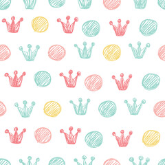 Seamless polka dot pattern with crowns in pastel colors. Childish doodle style.