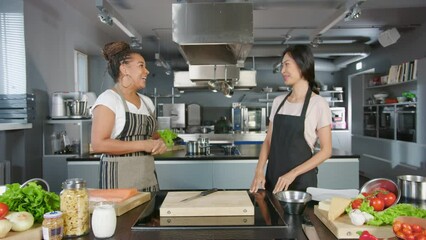 TV Cooking Show Kitchen with Two Master Chefs. Two Female Presenters Talk. Professionals Teach How to Cook Food, Discuss Delicious Dish Recipe. Online Video Class Course. Healthy Meal Preparation