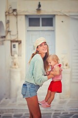 mother and daughter in the city of paros greece