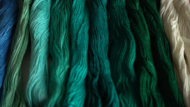 A top view of colorful mouline threads isolated on a white background.