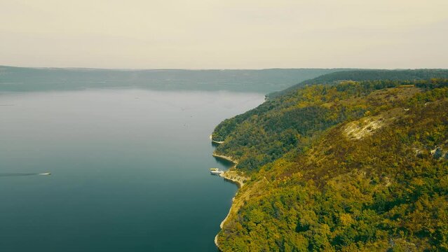 Bakota is a flooded village in the Kamianets-Podilskyi District of the Khmelnytsky Region of Ukraine. Wonderful landscape of a beautiful large lake formed by the overflow of the river.