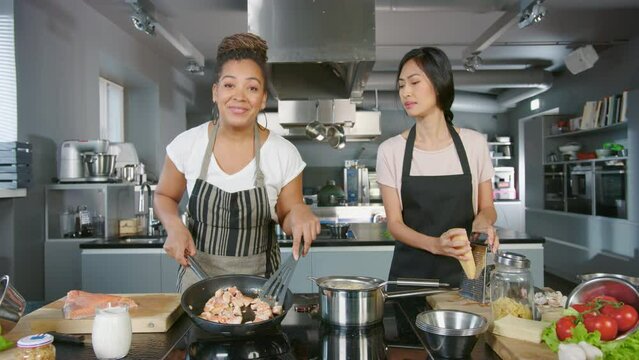 TV Cooking Show Kitchen with Two Master Chefs. Two Female Presenters Teach How to Cook Food. Professionals Talk about Delicious Dish Recipe. Online Video Class Course of Healthy Meal Preparation