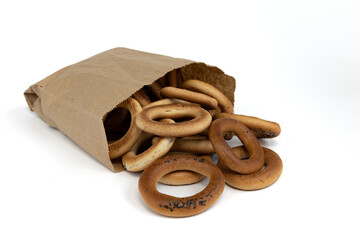 pile of bagels with poppy seeds isolated on white
