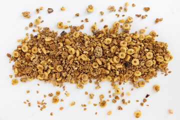 frame of crunchy granola on white background, food concept