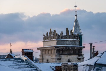 Ukraine, Lviv, VUL. VICHEVA, 2 - January, 2022: Mannerist attic of tower of CHURCH OF ALL SAINTS...