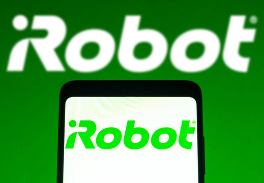 January 31, 2022, Brazil. In this photo illustration the iRobot Corporation logo seen displayed on a smartphone and on the background.