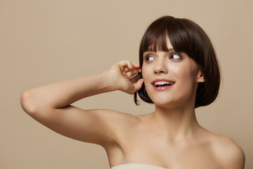 Naklejka premium woman cosmetics attractive look posing clean skin isolated background