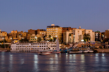 Obraz premium Evening view of Aswan skyline and the river Nile, Egypt