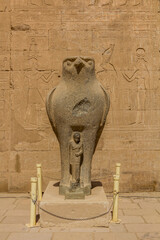 Horus as falcon guarding the temple in Edfu, Egypt