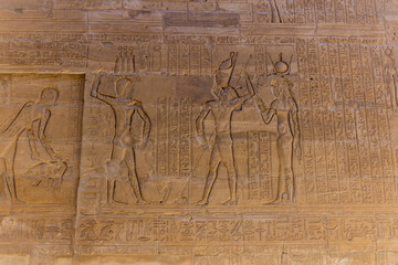 Fototapeta na wymiar Hieroglyphs in the temple of Horus in Edfu, Egypt