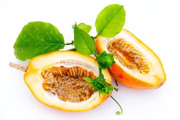Brazilian sweet passion fruit. Opened fruit, bud, leaves, branch and tendril of a passion fruit...
