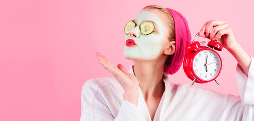 Cosmetics procedures. Woman with cosmetic mask with clock. Natural ingredients. Wellness and Spa.