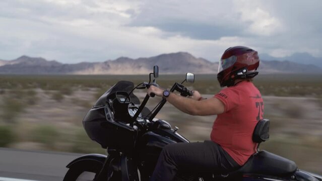 Biker driving on the Highway on legendary Route 66 to Oatman, Arizona.