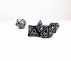  RPG dice in various shapes, runic on a white background
