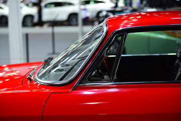 red car on the road