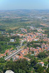 Naklejka premium Aerial view of town of Sintra and landscape from top of Castle of the Moors, Sintra, Lisbon District, Portugal. 
