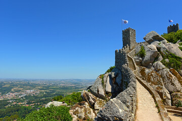 Castle of the Moors (Portuguese: Castelo dos Mouros) is medieval castle by Moors in town of Sintra,...