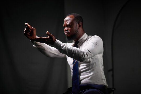 Man speaking with sign language in a studio