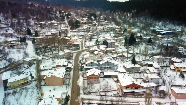 Winter scene on Bozdag mountain. Houses and streets are white with snow. Odemis, Izmir, Turkey. High quality 4k footage