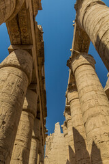 Decorated columns of the Great Hypostyle Hall in the Amun Temple enclosure in Karnak, Egypt