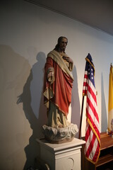 statue of Jesus and Flag