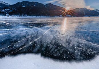 frozen alpine lake in the winter  