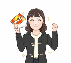 使い捨てカイロをもつ女性