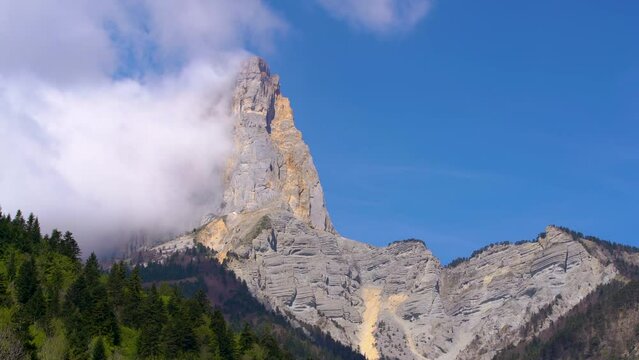 The steep Mont Aiguille in the Vercors Regional Natural Park in Summer. Isere (Rhone-Alpes), French Alps, France
