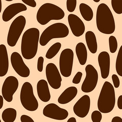 Animal skin seamless pattern. Vector illustration. Round and oval brown spots on beige background