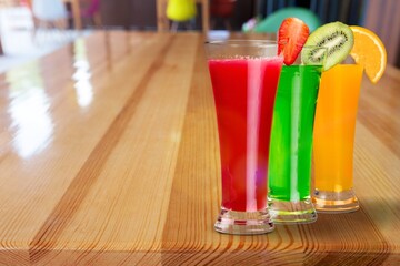 Cocktails drinks. Classic alcoholic long drink with berries, herbs and ice