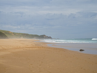 Fototapeta na wymiar Johanna Beach on a windy and overcast summer afternoon - Johanna, Victoria, Australia