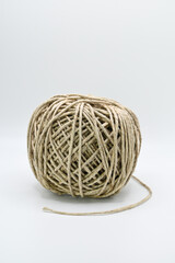 Roll of natural brown decorative string.