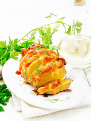 Potatoes puff bacon in plate on napkin