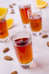 Transparent brown liquid in a glass