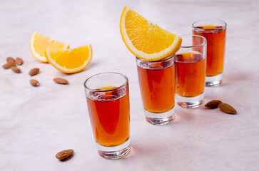 Transparent brown liquid in a glass