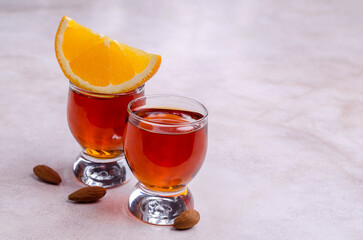 Transparent brown liquid in a glass
