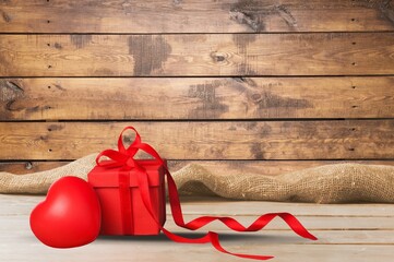 Red gift or present box with red bow