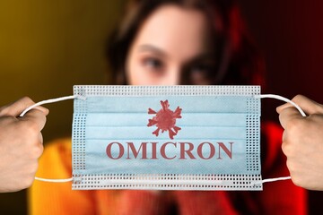 Medical face mask with - Omicron Covid-19 new variant - Omicron. Omicron variant of coronavirus