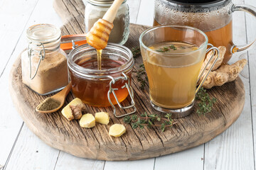 Healing medicinal elixir for lungs and respiratory system with thyme and ginger.