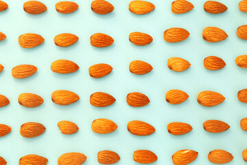 Brazilian nuts Almond Snack veggy. Arranged on a light green background. Copy space. Top view